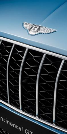 Infotainment system of Bentley Continental GTC Azure with 12.3 inch display screen featuring HDD navigation.