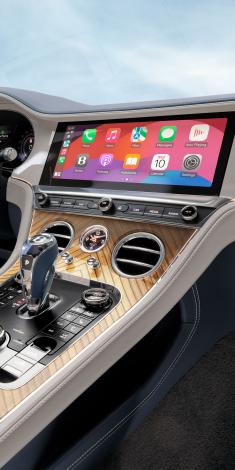 Bentley Continental GTC Azure V8  close up on heated, Duo-Tone Portland and Imperial blue hide, 3 Spoke, Hide Trimmed Steering Wheel. 