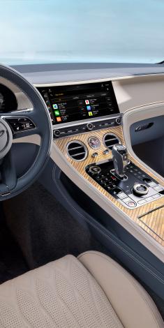 Bentley Continental GTC Azure V8  close up on heated, Duo-Tone Portland and Imperial blue hide, 3 Spoke, Hide Trimmed Steering Wheel. 