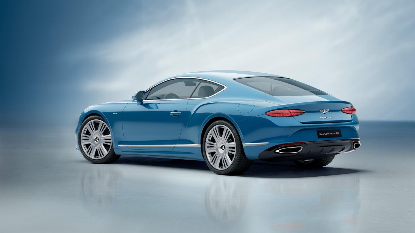 Rear three quarter of the new hybrid Bentley Continental GT Azure with a Light Windsor Blue exterior colour and exclusive Azure 22" wheels