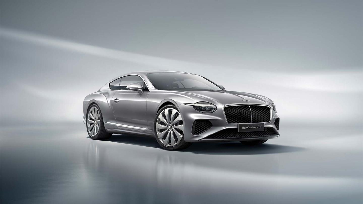 Front profile  of the new hybrid Bentley Continental GT Mulliner with a Patina exterior colour and exclusive Mulliner 22" directional wheels
