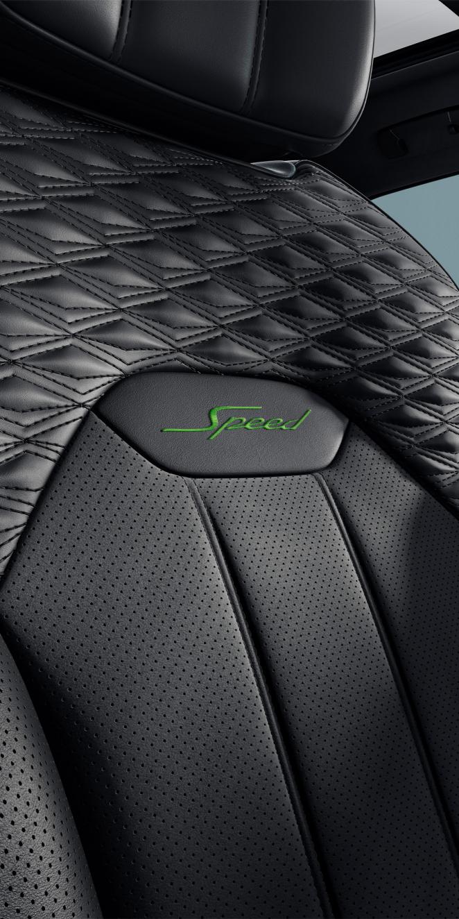 Front Seat with Speed emblem embroidery including Hyper Green main hide and Beluga secondary hide with precession diamond quilting and Speed colour split.
