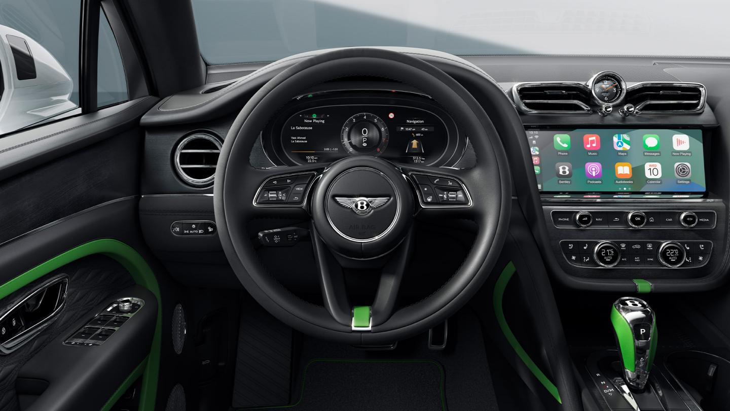Front on view of steering wheel and infotainment system.