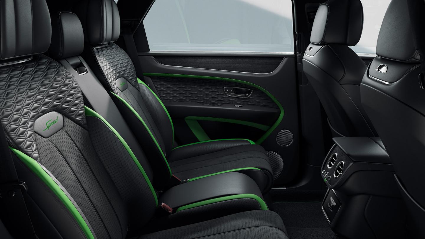 Rear cross-cabin view with Hyper Green main hide and Beluga secondary hide with precession diamond quilting and Speed colour split.