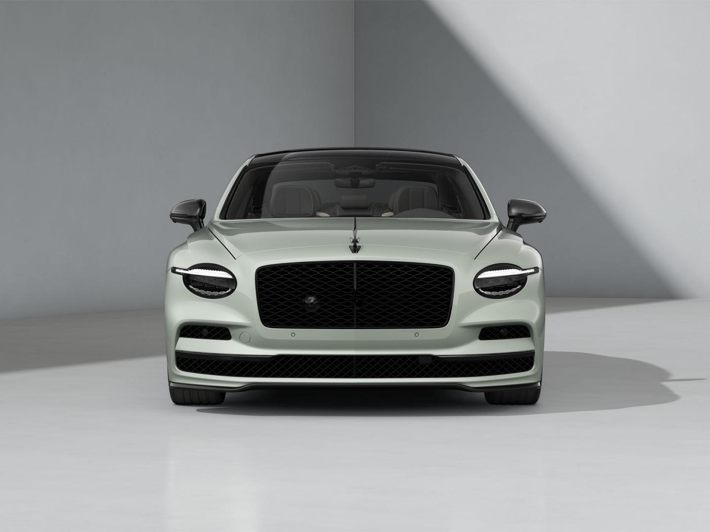 Front-on shot of the Bentley Flying Spur S in Opalite with Blackline Specification and black exterior detailing.