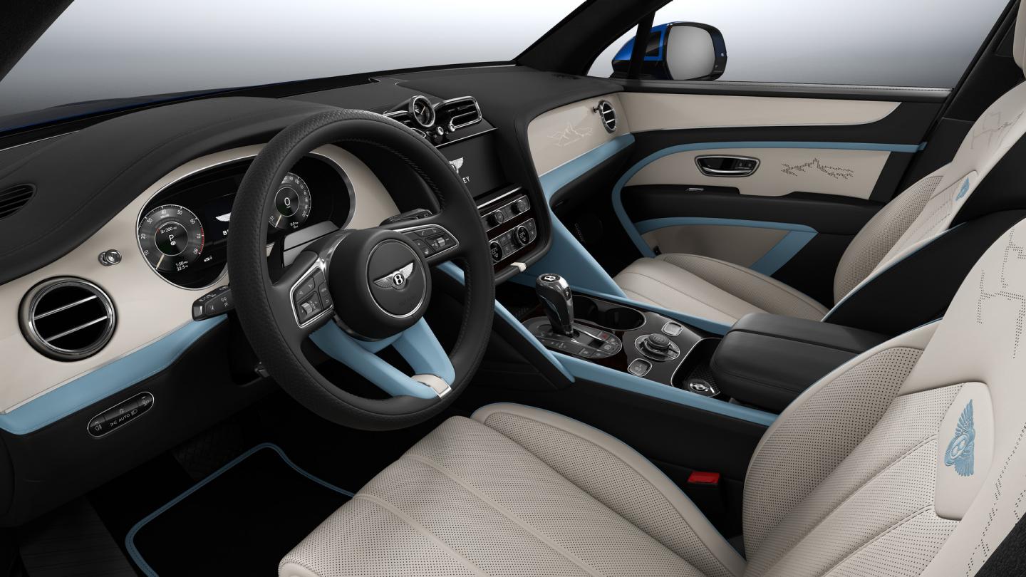 Bentley Bentayga Artenara Edition SUV Piano Linen veneer with Artenara detail and Linen and Beluga Black hides with Light Blue accents front cabin