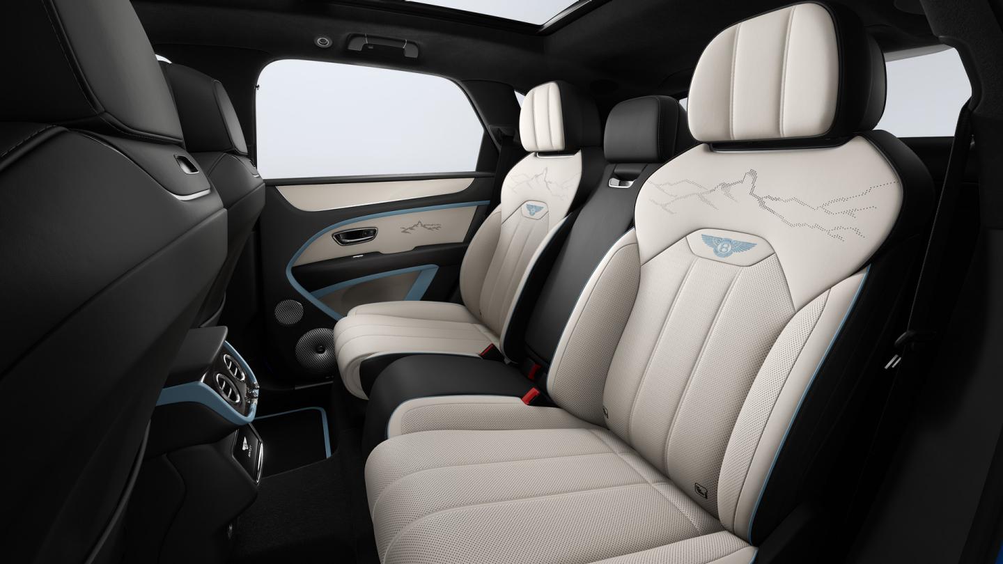 Bentley Bentayga Artenara Edition SUV Piano Linen veneer with Artenara detail and Linen and Beluga Black hides with Light Blue accents rear cabin