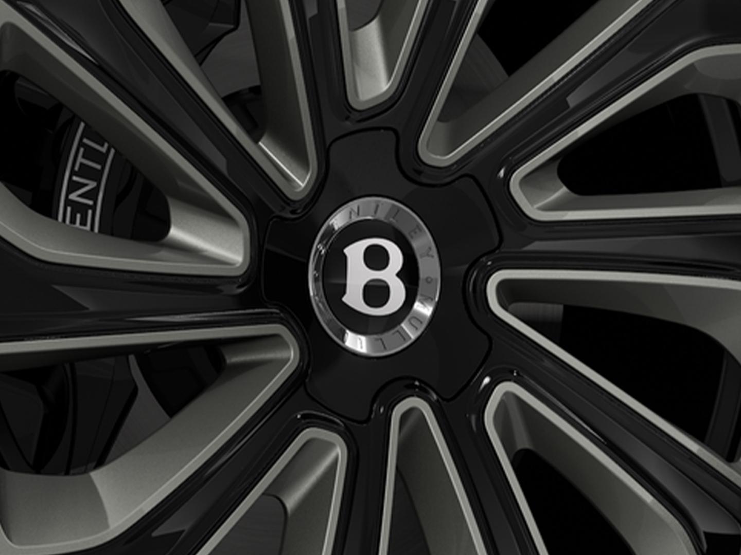 Bentley Bentayga Artenara Edition SUV front detail in Sequin Blue paint and 22” Mulliner Gloss Black wheels front 3/4