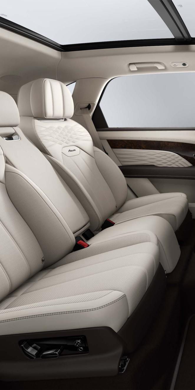 Bentley Bentayga EWB Azure SUV in Linen and Burnt Oak hides rear seats