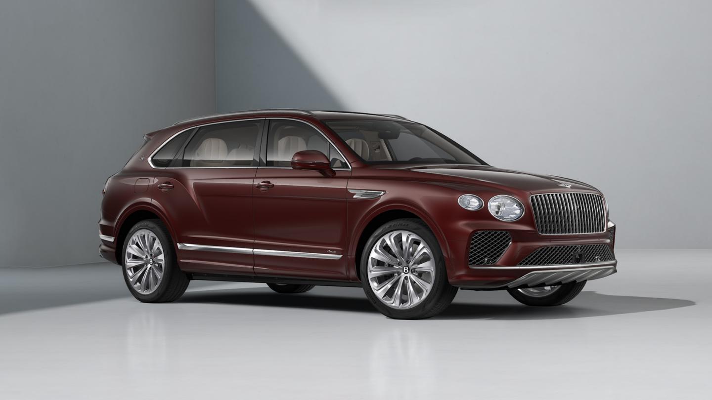 Bentayga EWB Azure SUV in Cricket Ball paint with 22" Ten Spoke Wheels front three quarter