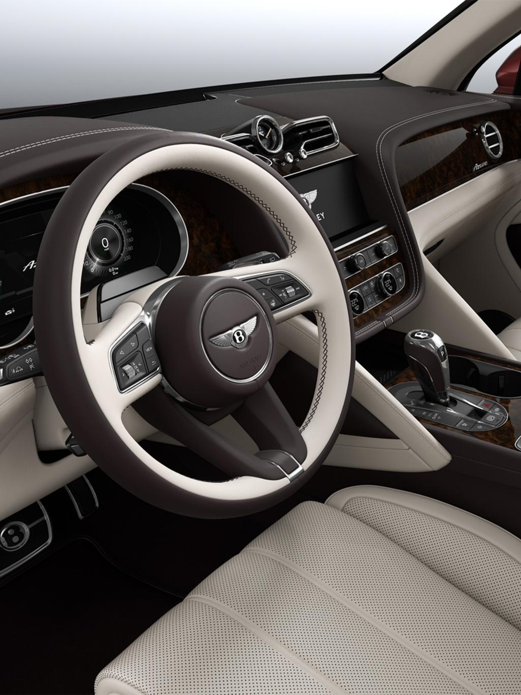 Bentley Bentayga EWB SUV in Linen and Burnt Oak hides steering wheel and veneer in sight