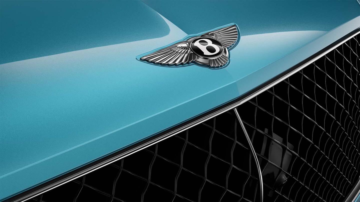 Bentley Bentayga EWB in Moonbream colour featuring 21 inch Five Twin-Spoke Wheels-Painted and lower Matt Black matrix grille.