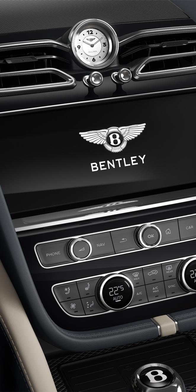 Bentley Bentayga EWB Mulliner SUV in Camel and Brunel hides with Portland accents and Grand Black with Mulliner Overlays and Aluminium Console veneer infotainment system