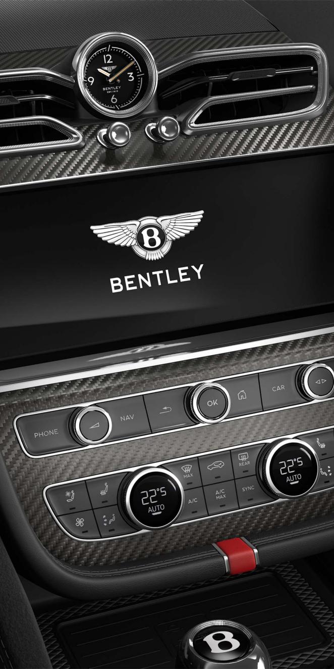 Bentley Bentayga Speed SUV in Pillar Box Red and Beluga hides with  Carbon Fibre veneer front infotainment system