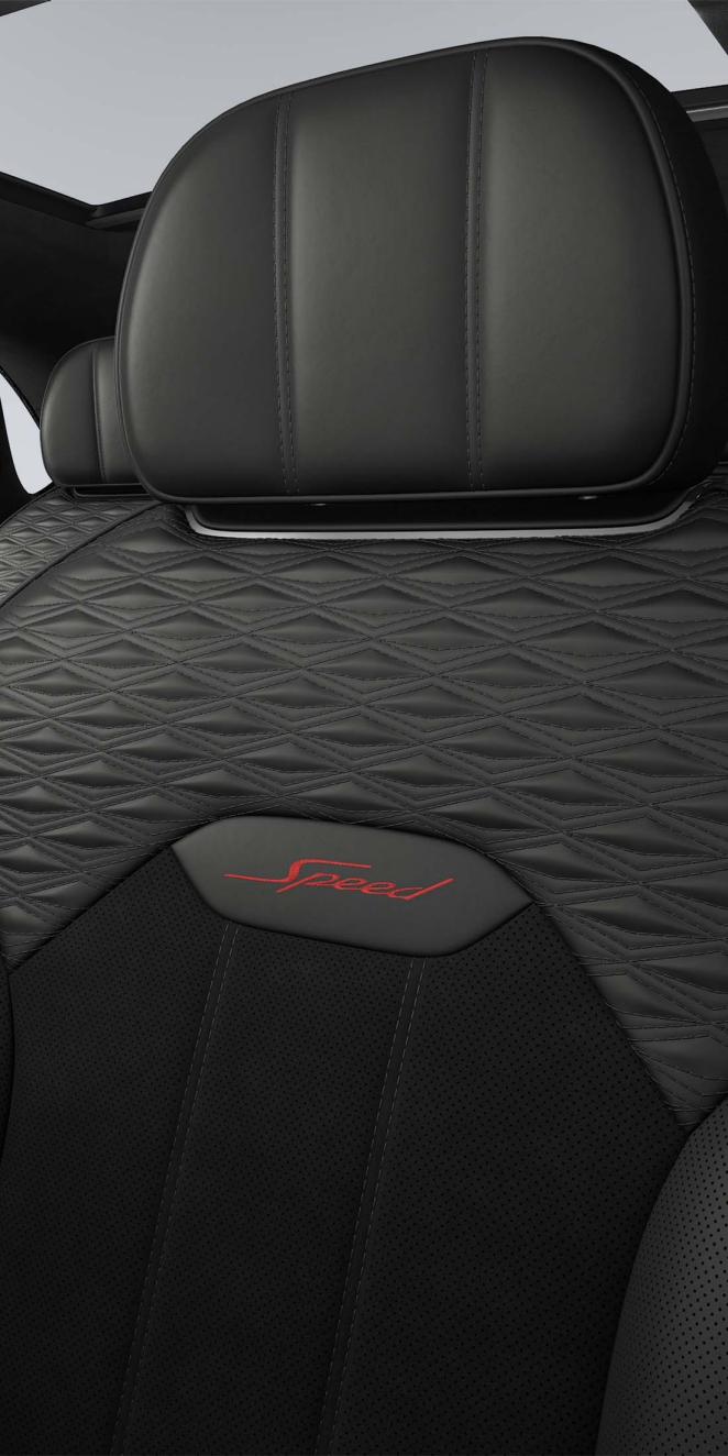 Bentley Bentayga Speed SUV in Pillar Box Red and Beluga hides front seat with Speed detailing