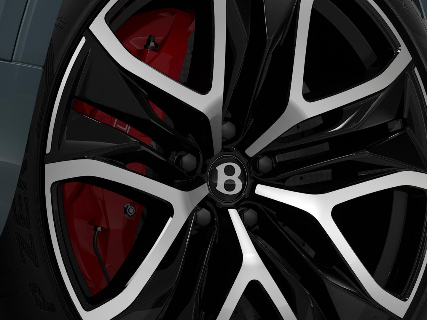 The 23 inch Directional Wheels in the Black Painted option close up