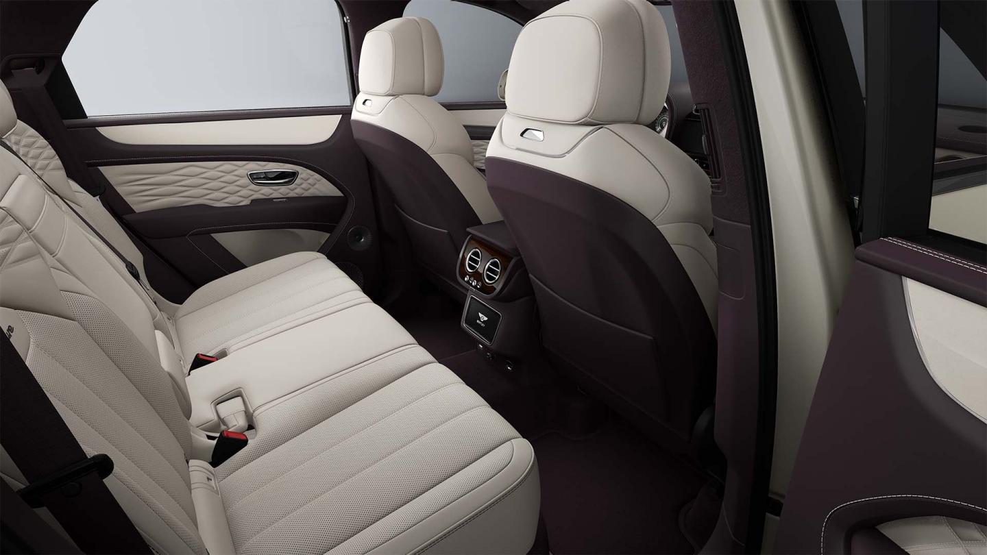 Rear cabin of the Bentley Bentayga Azure featuring Linen main hide and Damson secondary hide