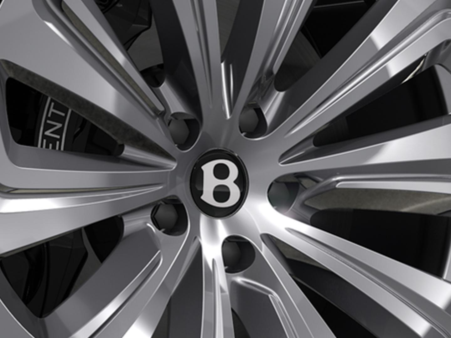 Textured view of the 22" Ten Spoke Polished wheel available on a Bentley Bentayga Azure