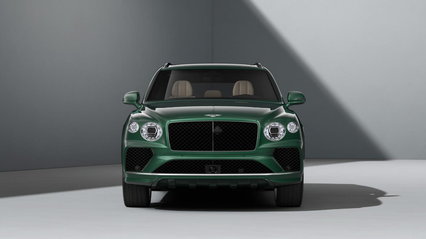 Front profile of a Bentley Bentayga SUV in Verdant Exterior paint