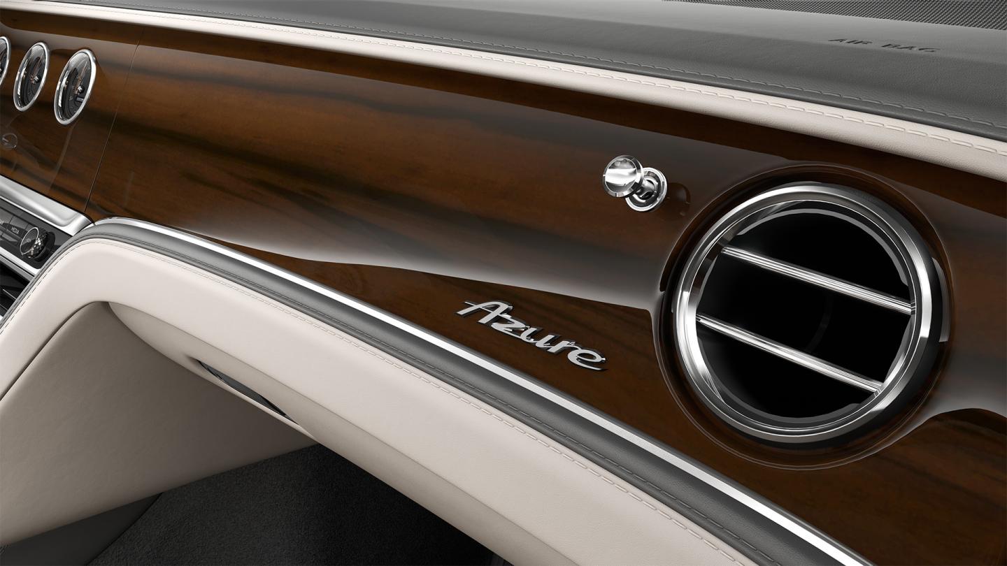 Close-up of the Liquid Amber veneer and air conditioning vent inside the Bentley Flying Spur Azure.