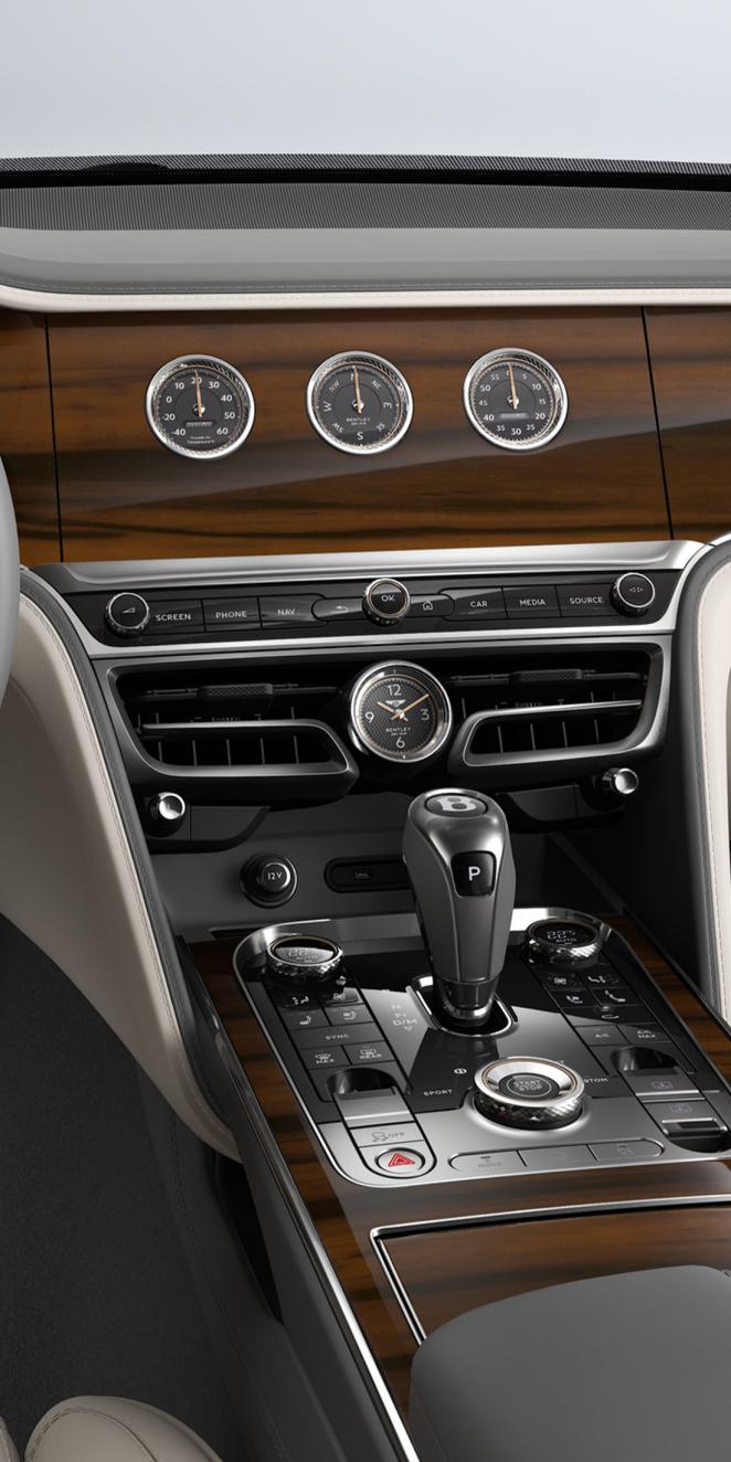 Interior shot of the Bentley Flying Spur Azure rotating display with Liquid Amber veneer.