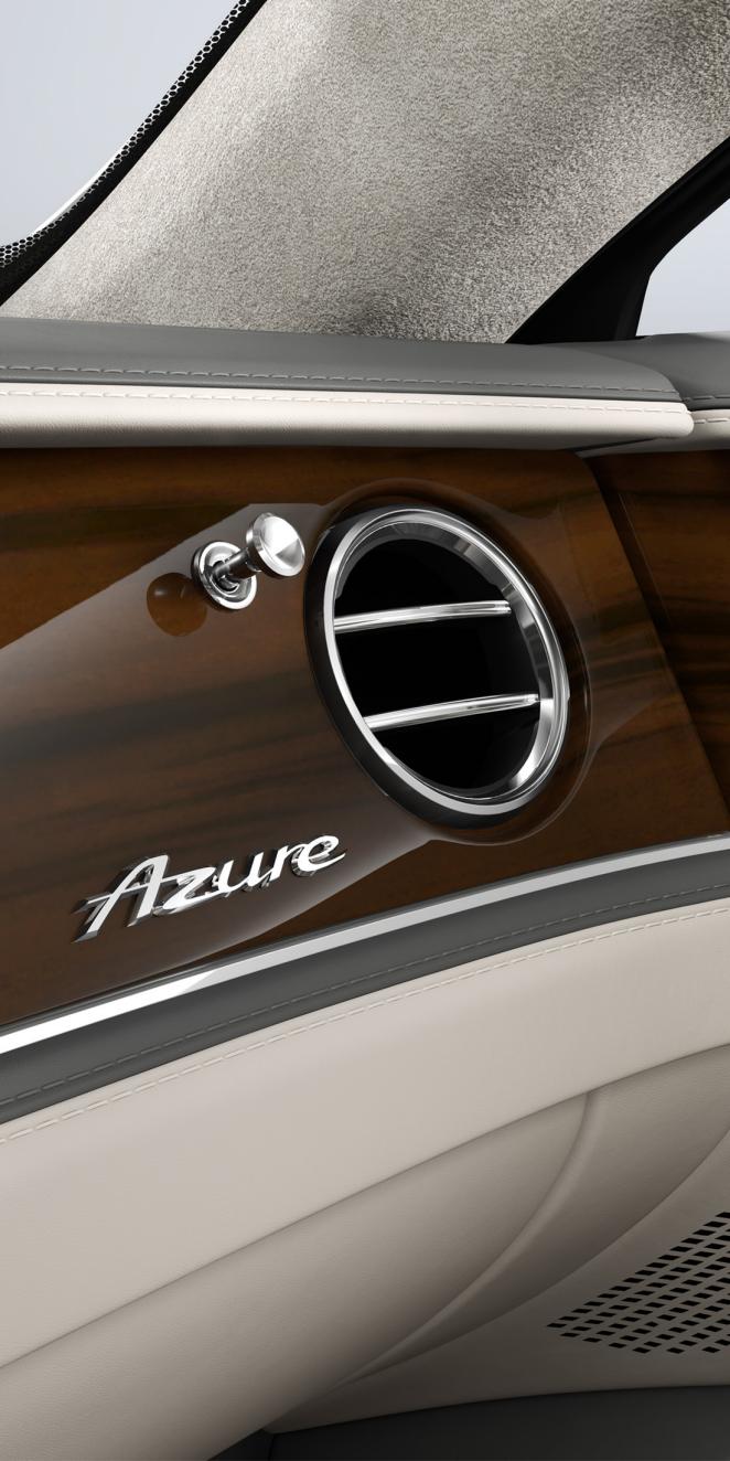 Close-up of the Liquid Amber veneer and air conditioning vent inside the Bentley Flying Spur Azure.