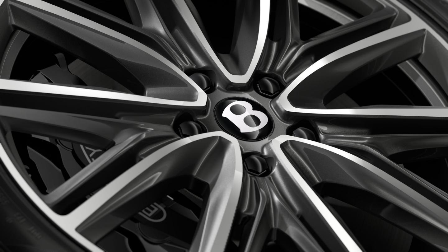 Close-up of the Bentley Flying Spur 21" Ten Twin Spoke Wheel in Dark Grey Painted and Bright Machined finish.