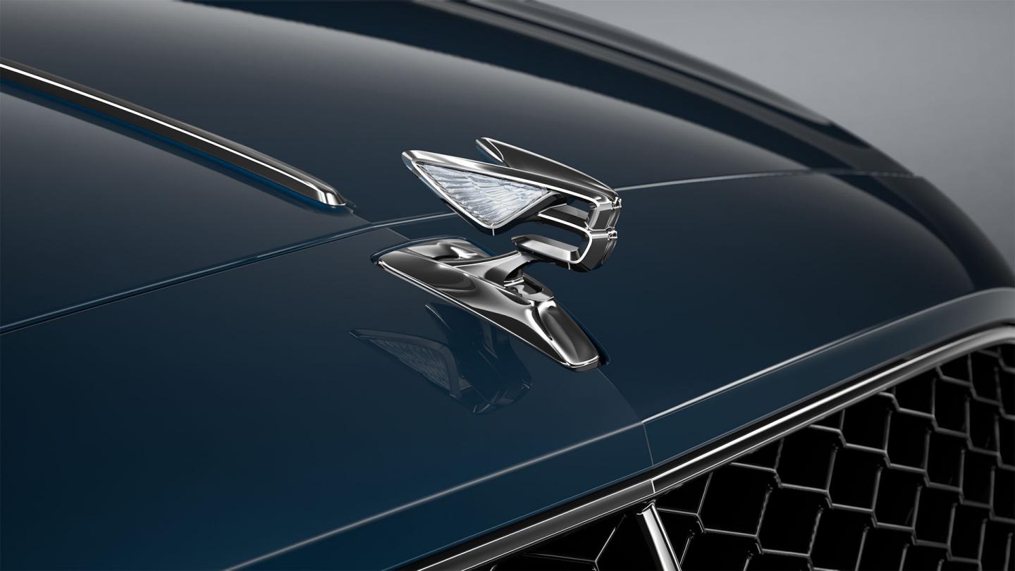 Close-up of the Flying B bonnet mascot on the Bentley Flying Spur in Marlin.