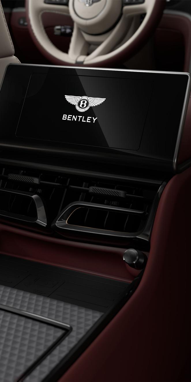 Rear passenger digital screen inside the Bentley Flying Spur Mulliner with Linen, Cricket Ball and Stratos cabin trim.