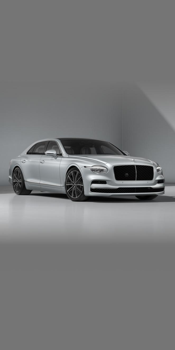 Front side angled view of Bentley Flying Spur in Silver colour, featuring 20 inch Five Twin - Spoke Wheel - Painted.