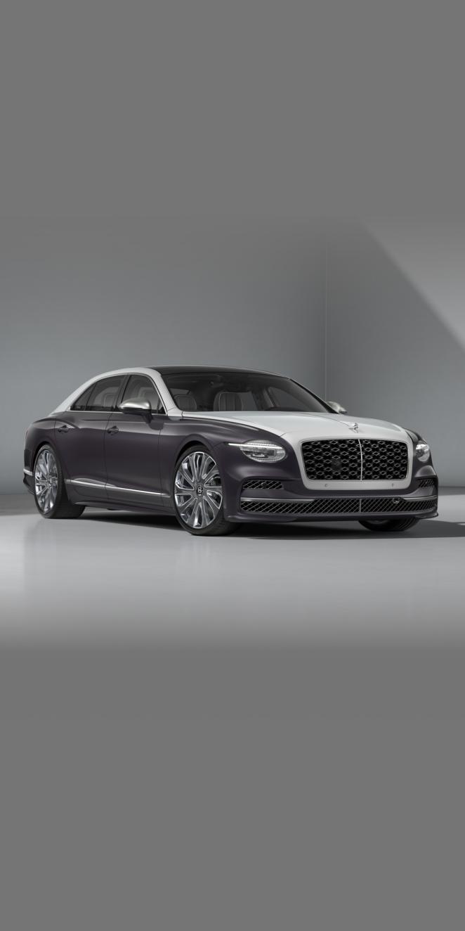 Front side angled view of Bentley Flying Spur Mulliner in Duo Tone Exterior Colours
