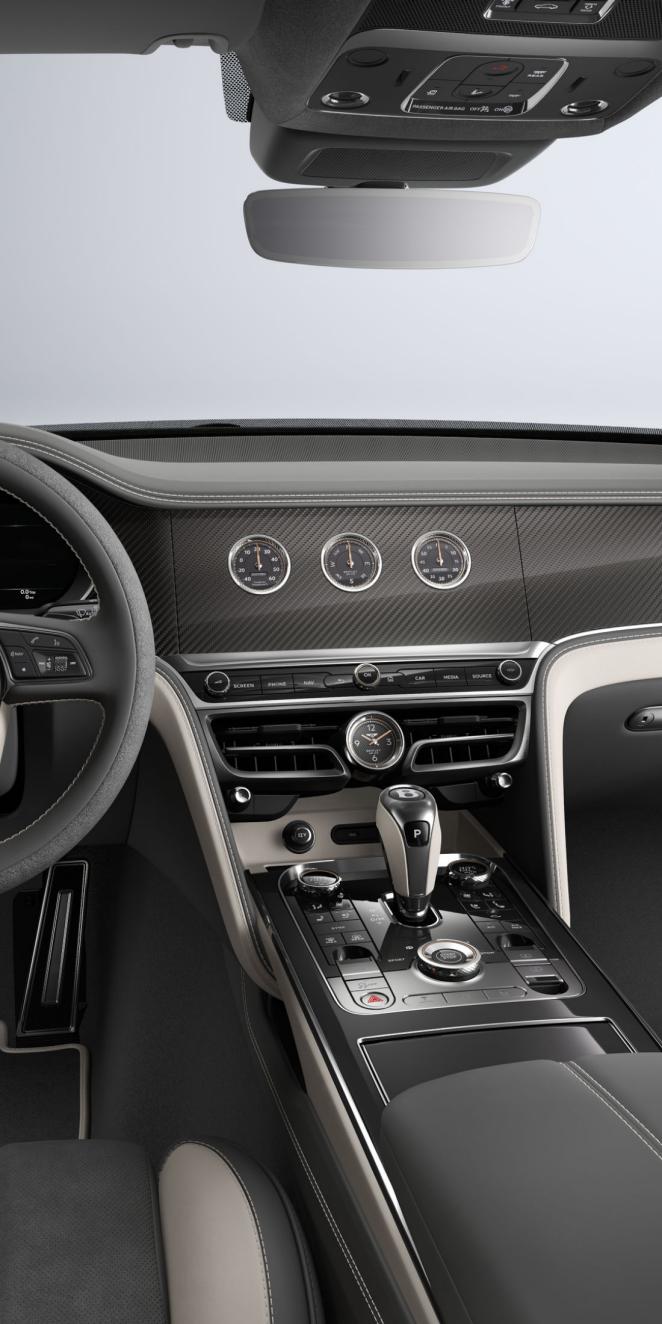 Interior shot of the Bentley Flying Spur S rotating display with Piano Black Console and High Gloss Carbon Fibre veneer.