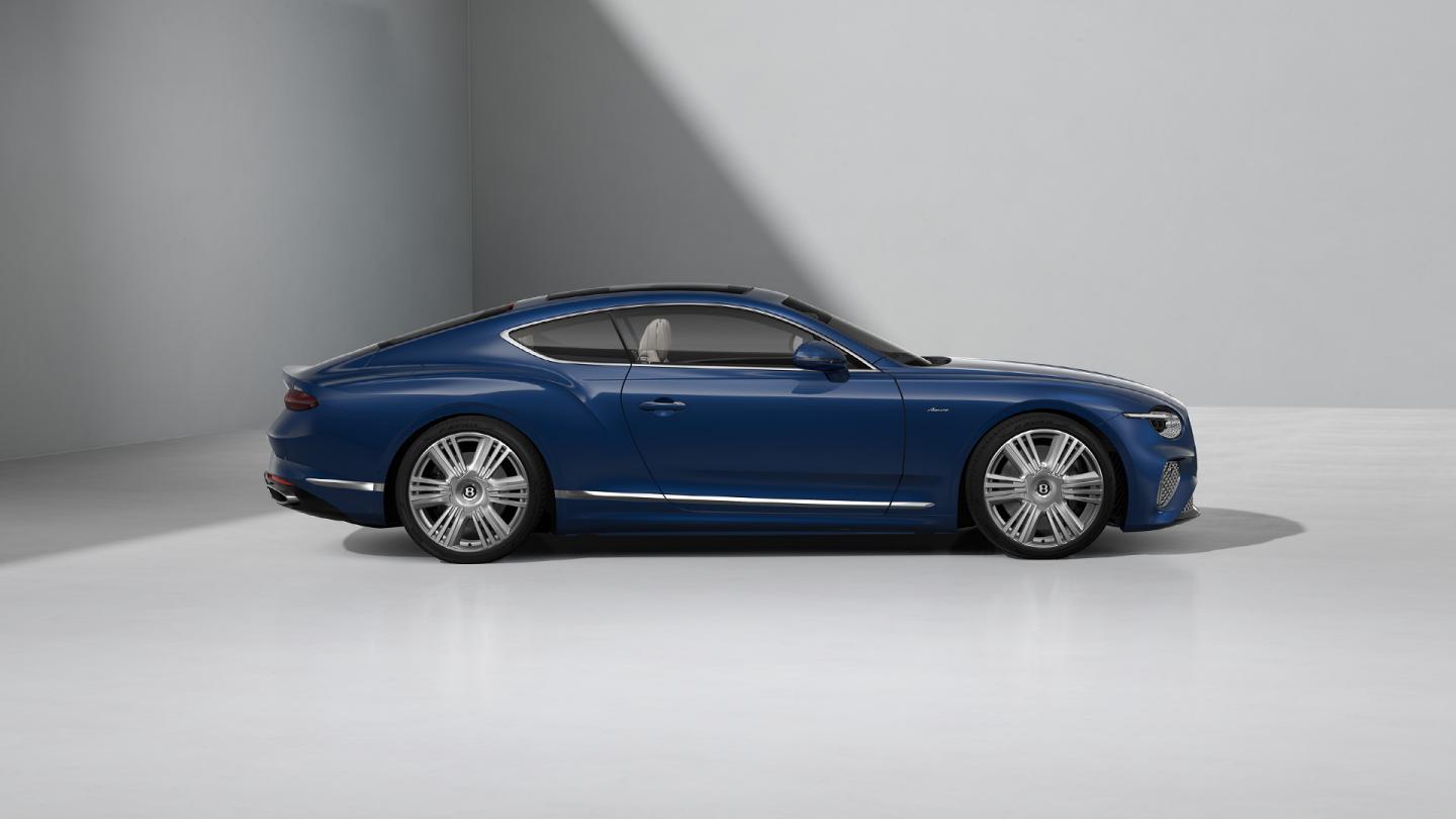 Side profile of the Bentley Continental GT Azure in Moroccan Blue with 22" Azure Wheel painted in Silver and Bright Machined.