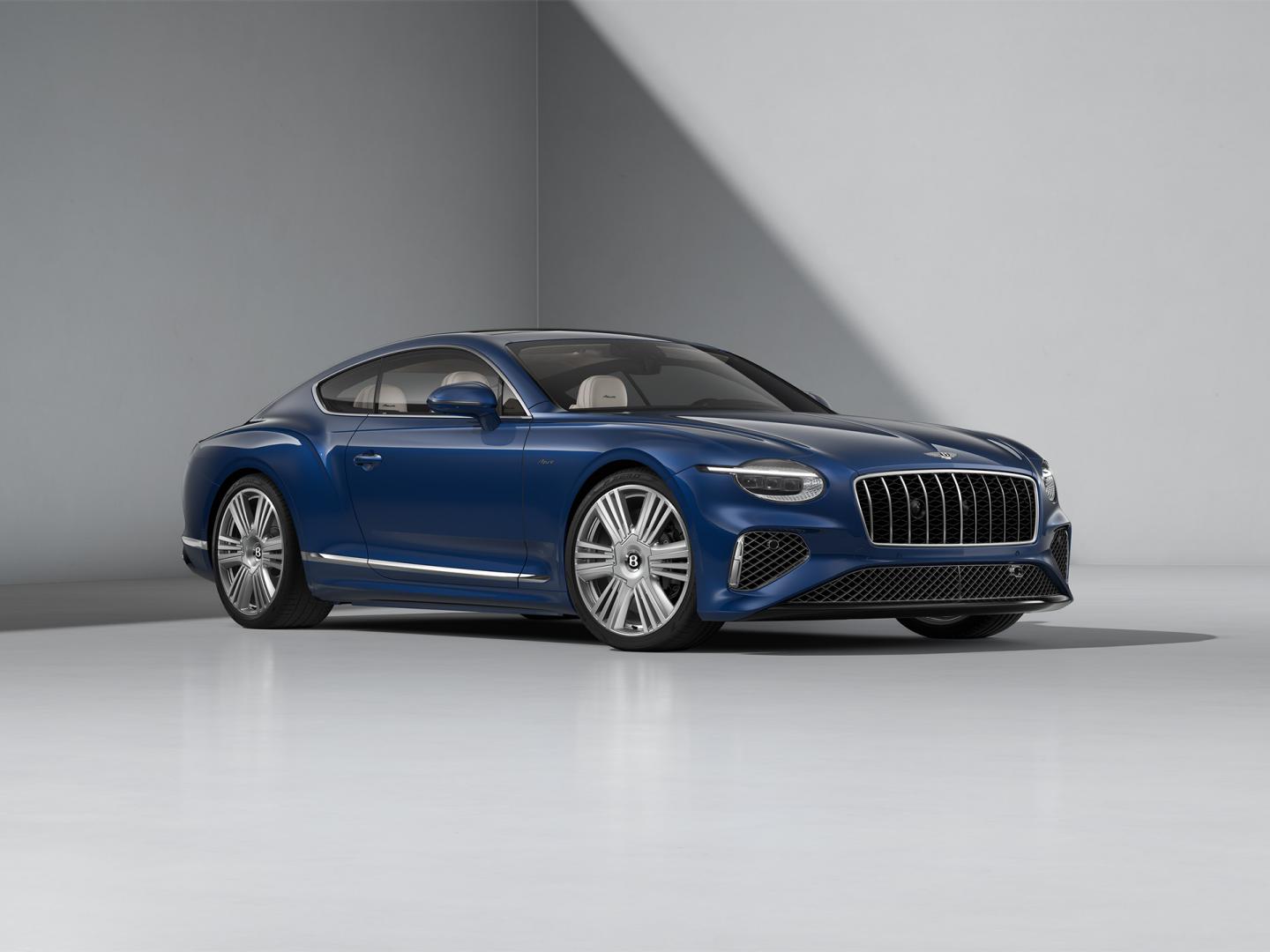 Front three quarters of the Bentley Continental GT Azure in Veridian.