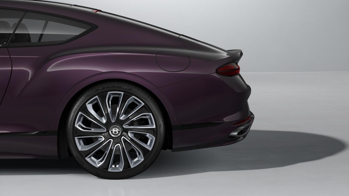 The front cabin of the new hybrid Bentley Continental GT Mulliner with a exclusive Mulliner colour split with Linen main hide and Damson secondary hide