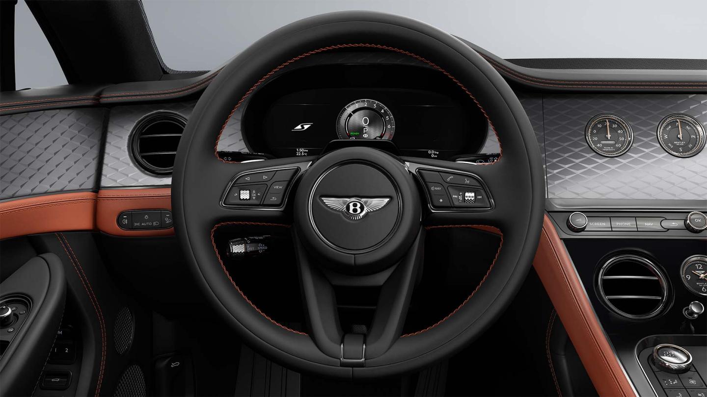 Drivers view of the steering wheel and drivers display in the new hybrid Bentley Continental GT S