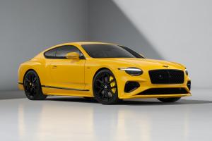 Front three quarters of the Bentley Continental GT Speed in Monaco Yellow.