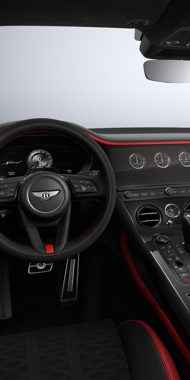 Cockpit view of the Bentley Continental GT Speed featuring a Cyber Yellow and Beluga hide.