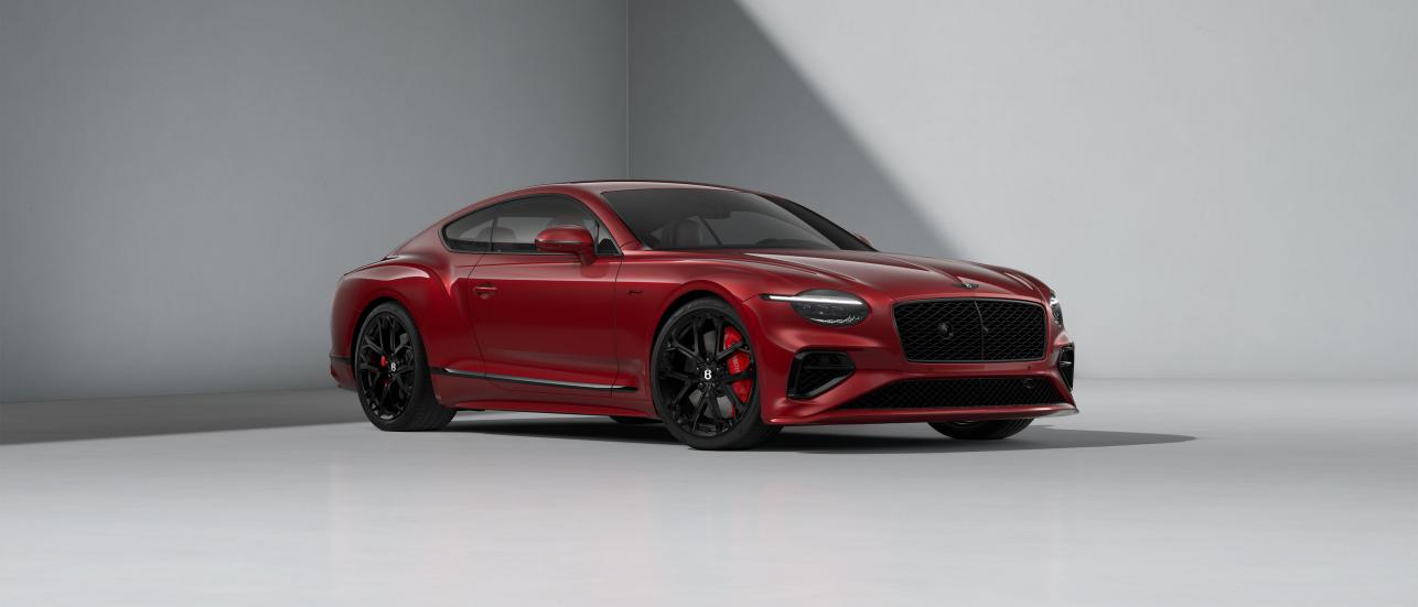 Front three quarters of the Bentley Continental GT Speed in Candy Red.
