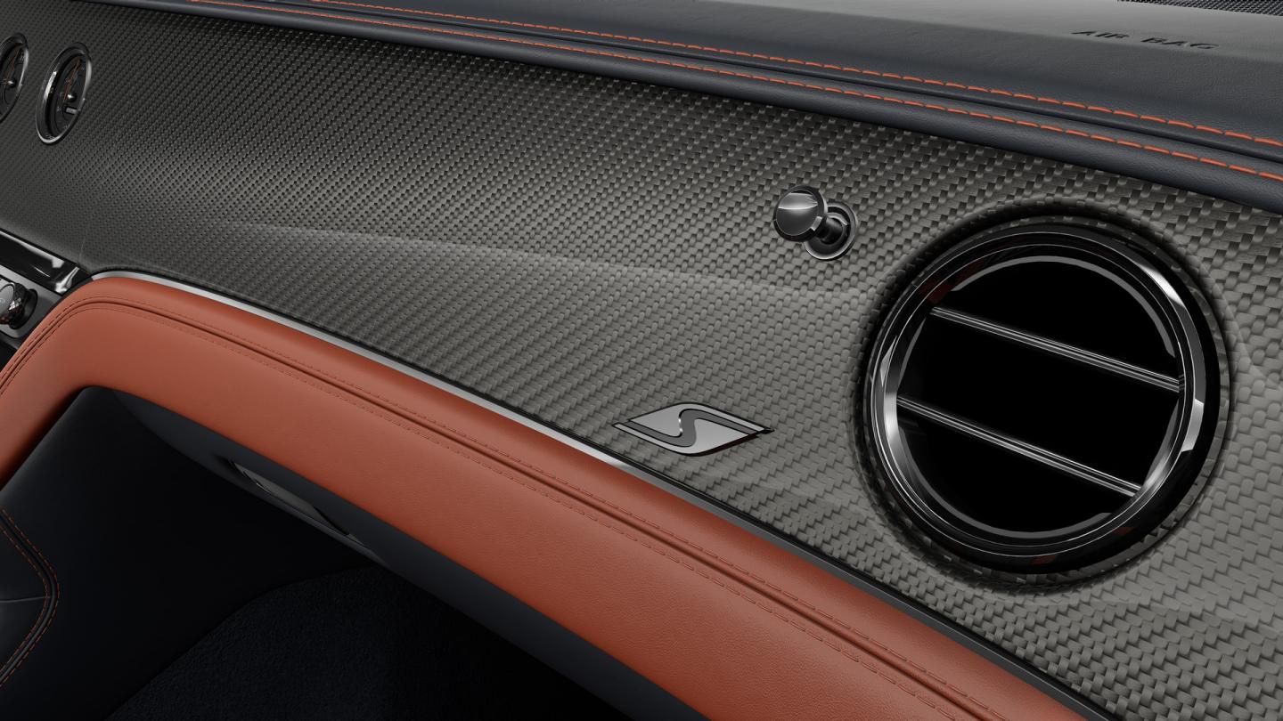 Close up a Bentley carbon fibre finish veneer in the new Continental GTC S