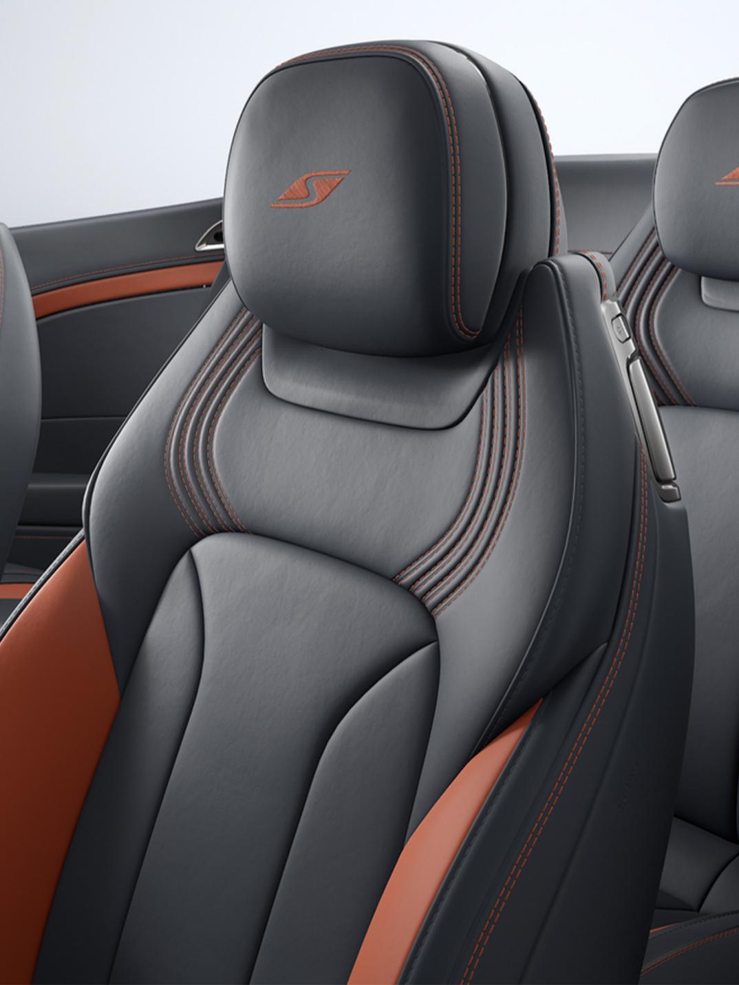 Close up of the drivers seat in Beluga main hide and Hotspur secondary hide with S seat flutting and badging on the headrest