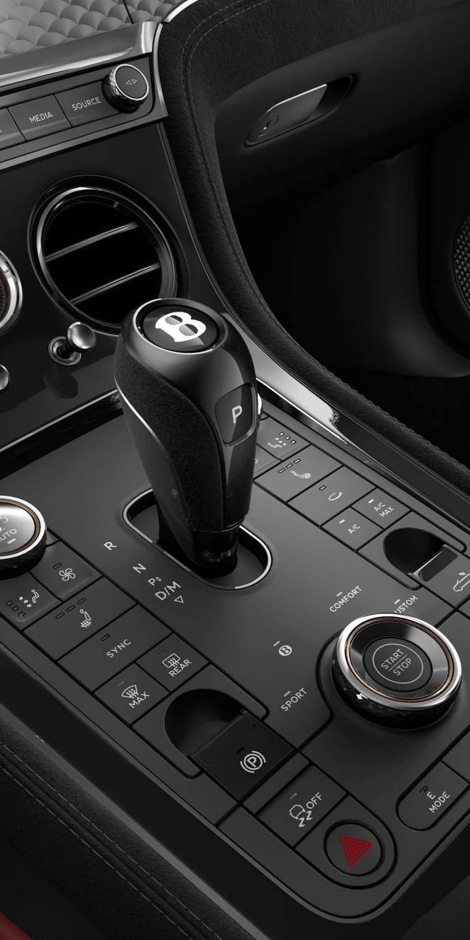Close up of the driver controls and gear lever in the new Bentley Continental GTC Speed