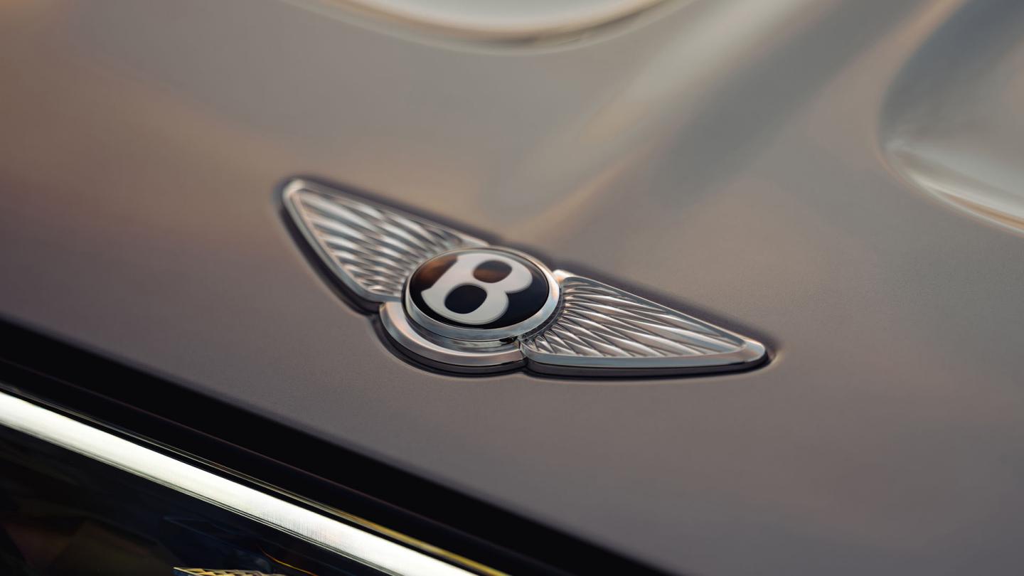 Close-up of the Bentley Wings bonnet badge on the Bentley Torcal.