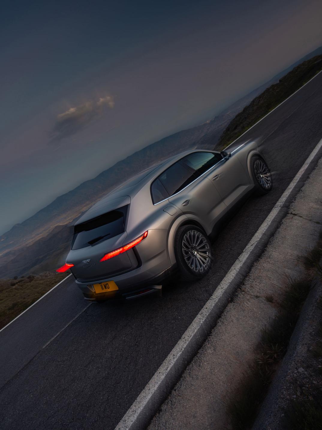 Rear three-quarter driving shot of the Bentley Torcal.