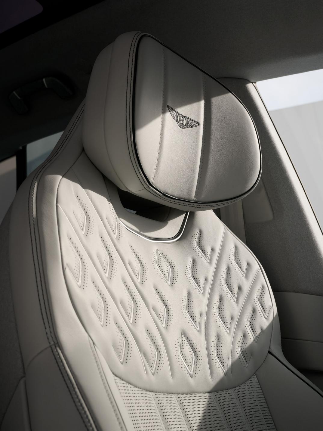 Close-up of the Bentley Torcal Harmony quilt pattern seat in Glaze and Teal upholstery.