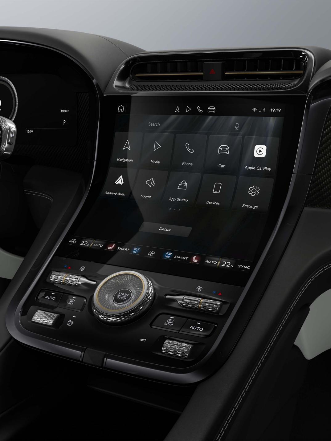 Close-up of the Bentley Torcal S infotainment display with Glaze and Beluga interior trim.