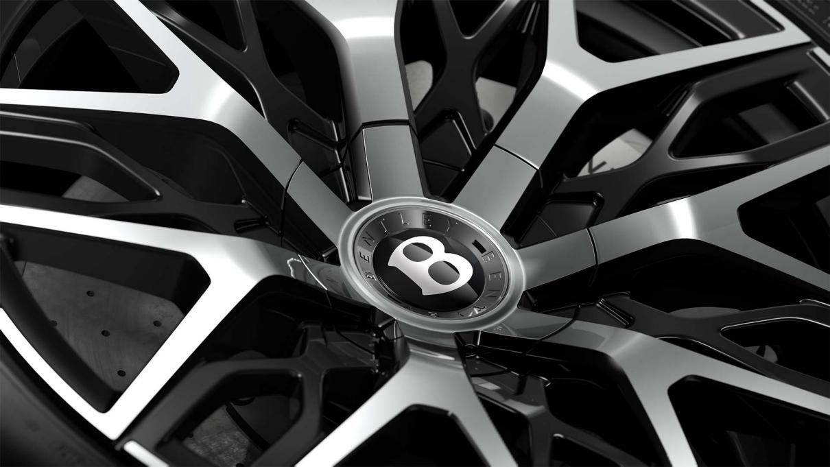 Close-up of the Bentley Torcal S 22" First Edition Wheel in Black with Liquid Silver Spokes.