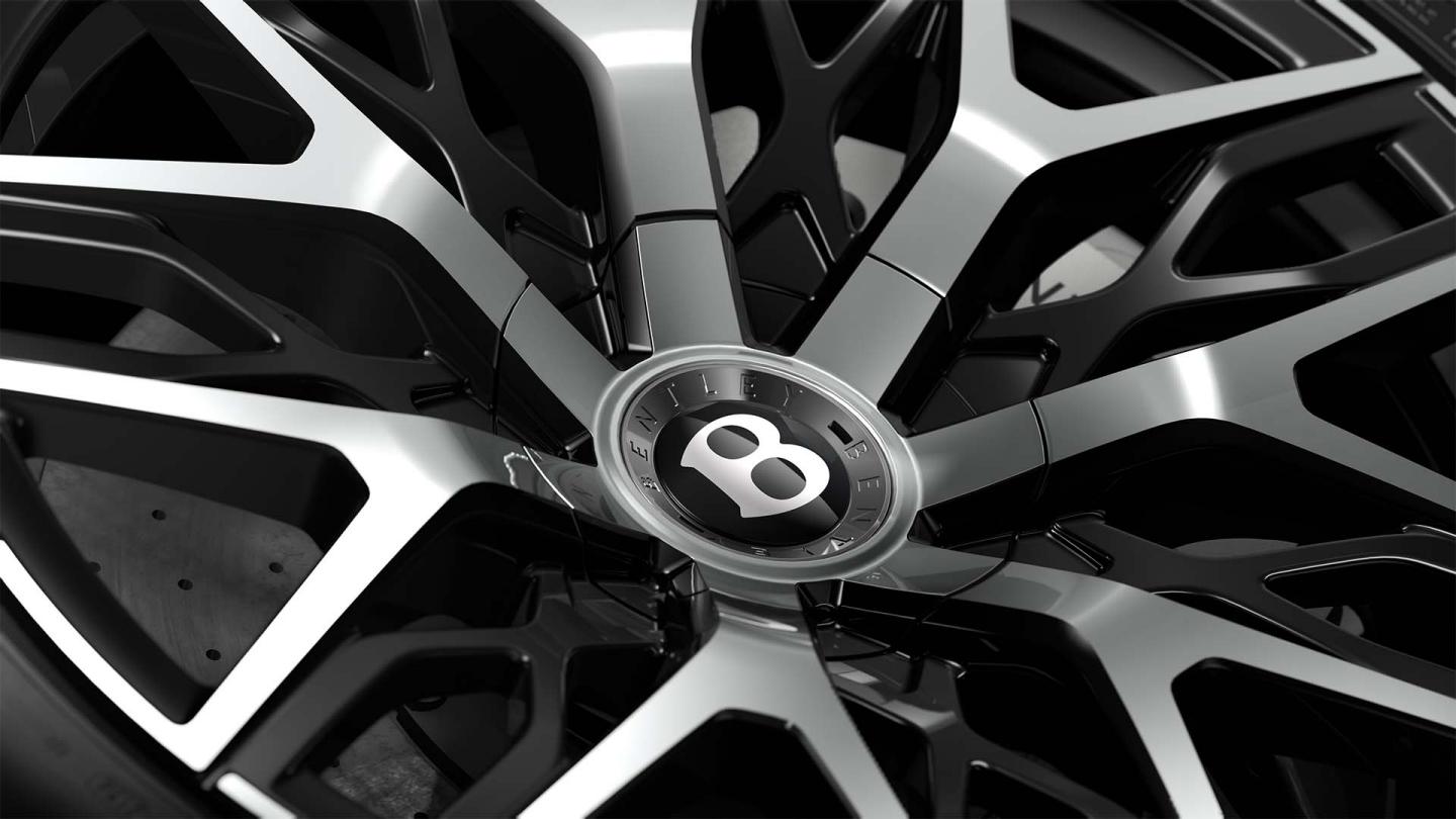 Close-up of the Bentley Torcal S 22" First Edition Wheel in Black with Liquid Silver Spokes.