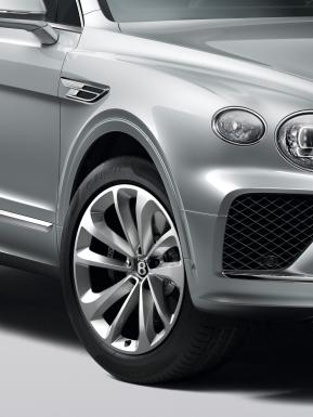 Front side angled view Bentley Bentayga in Moonbeam colour featuring 21 inch Five Twin - Spoke Wheel - Painted.