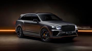 Bentley Bentayga S Black Edition front 3/4 featuring 22 inch S directional wheel - Black Painted and Polished as well as Mandarin accents on the styling kit
